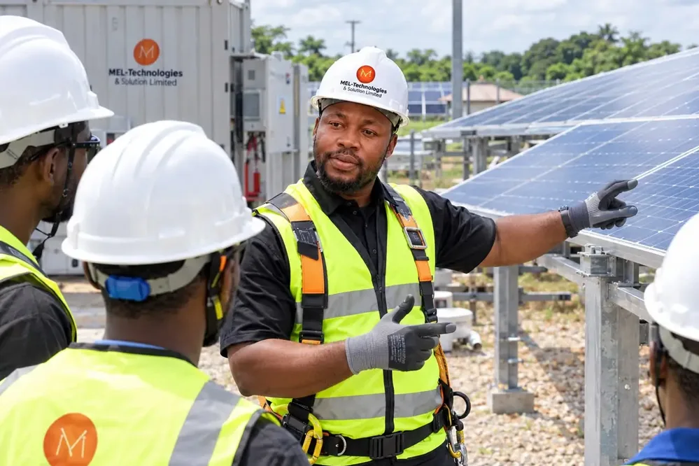 MEL-Technologies engineers installing a solar power system in Nigeria