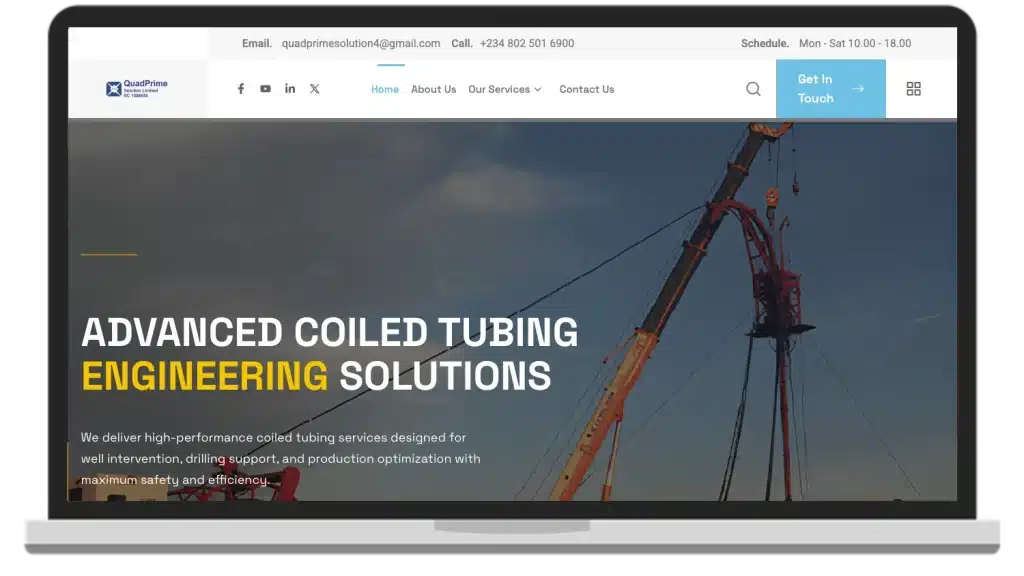 Screenshot of the QuadPrime Solution Limited website shown on a laptop, designed and developed by MEL-Technologies
